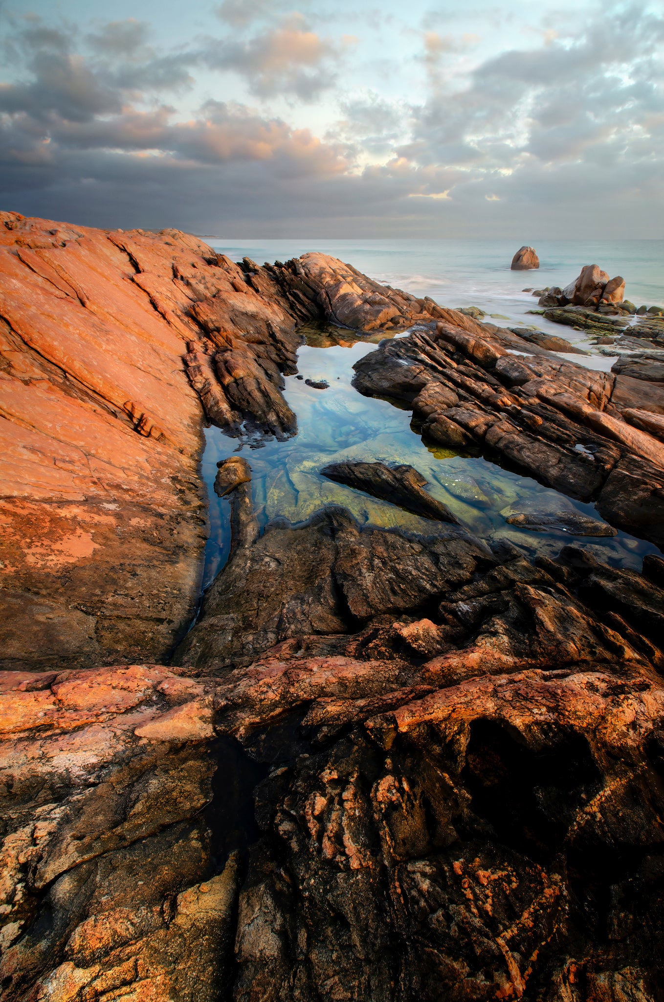 Stunning granite formations with a crystal clear rockpool.