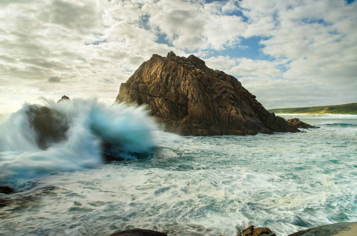 Crashing waves, showing no mercy towards anything in their path.