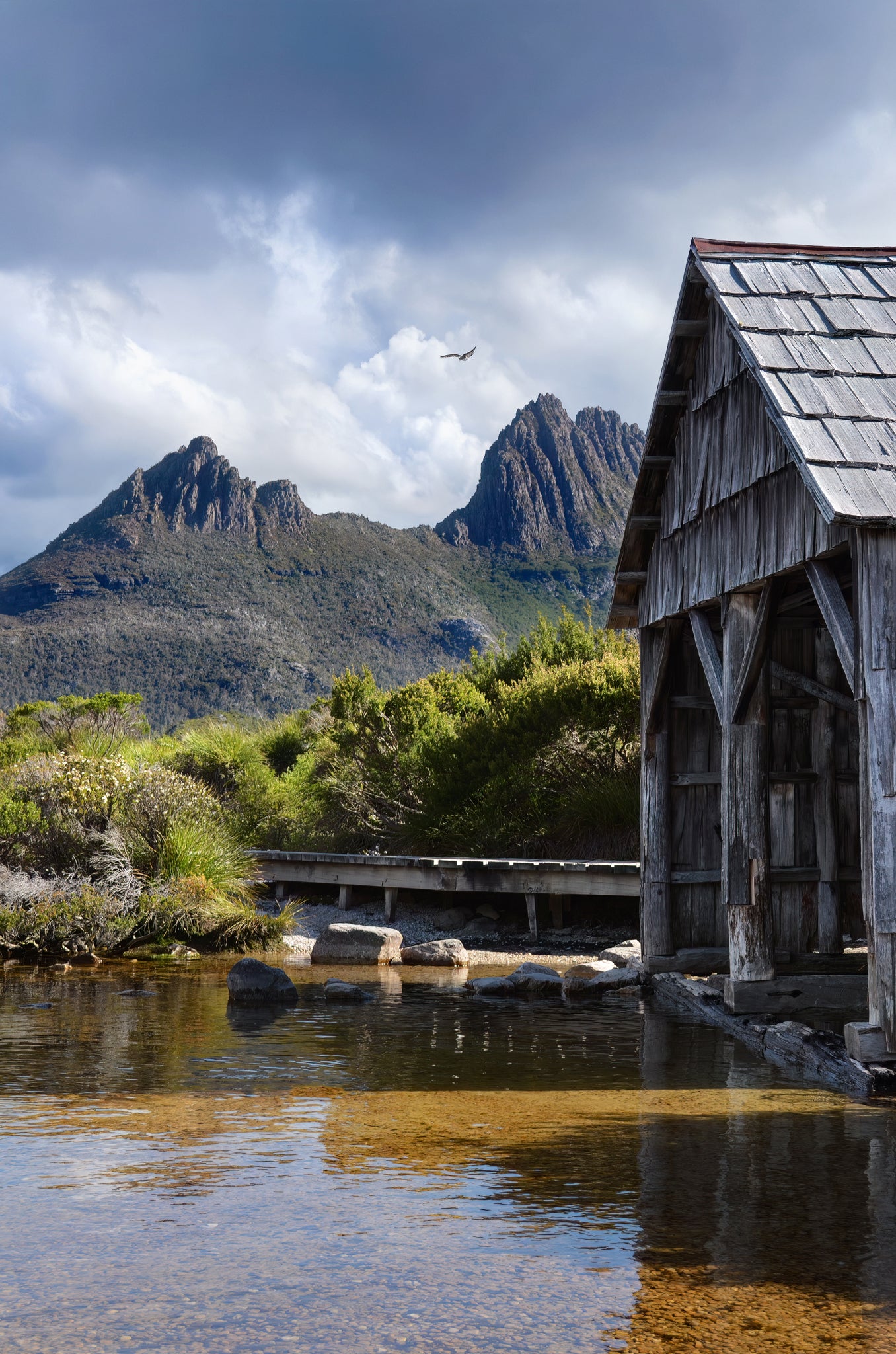 Wooden boat shed on Dove Lake next to Cradle Mountain, Tasmania.
