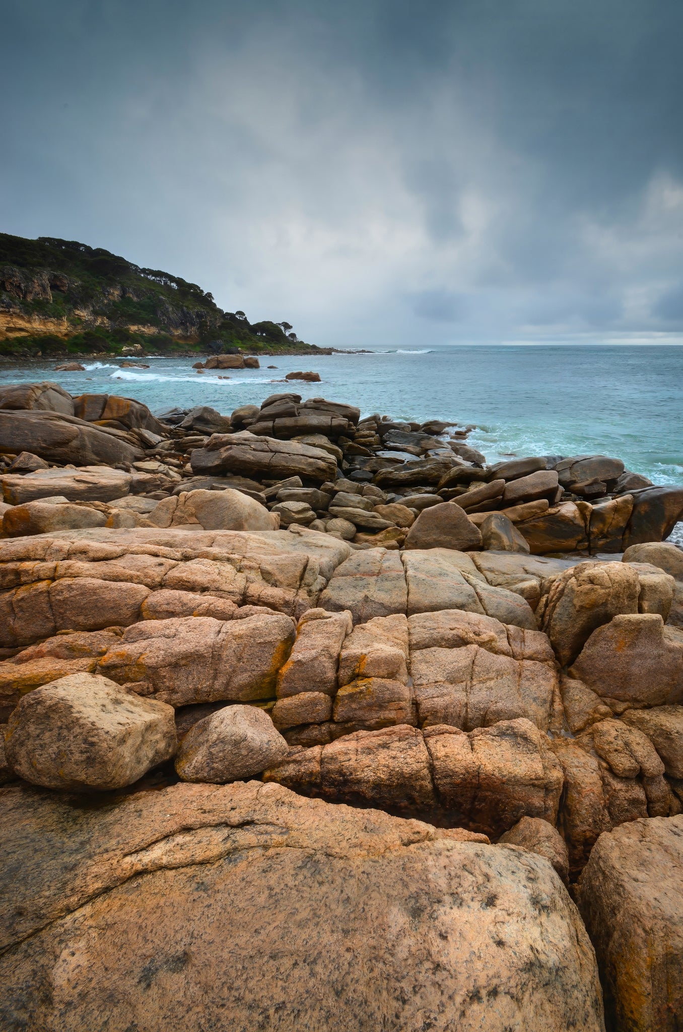 Heavy rain bands approaching Bunker Bay with low, fast-moving clouds signalling incoming weather.