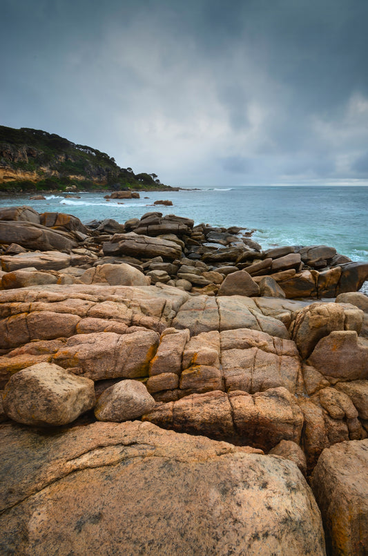Heavy rain bands approaching Bunker Bay with low, fast-moving clouds signalling incoming weather.