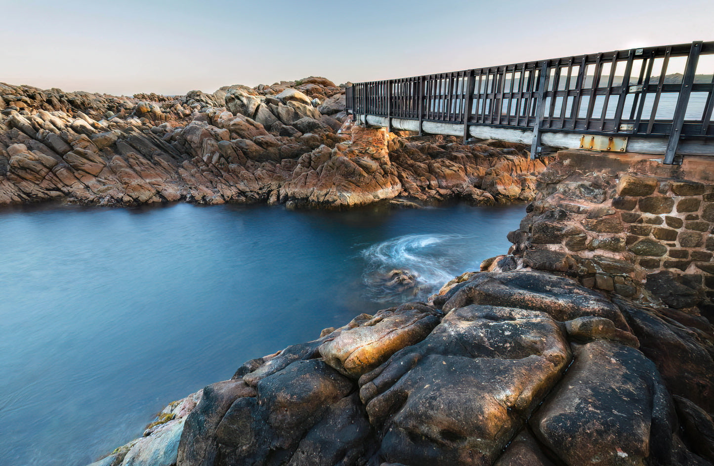 sunrise and calm at canal rocks along cape to cape coast