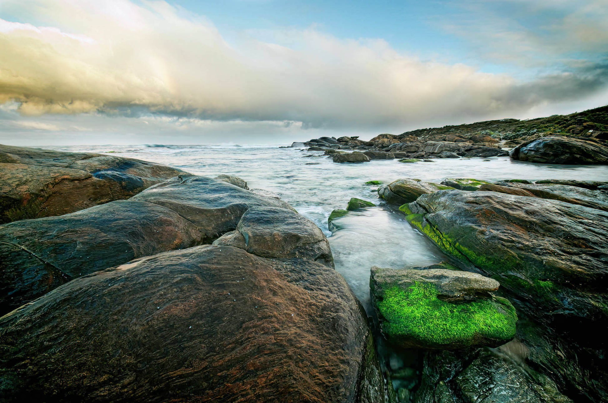 moss rocks beach redgate storm moody southwest clouds