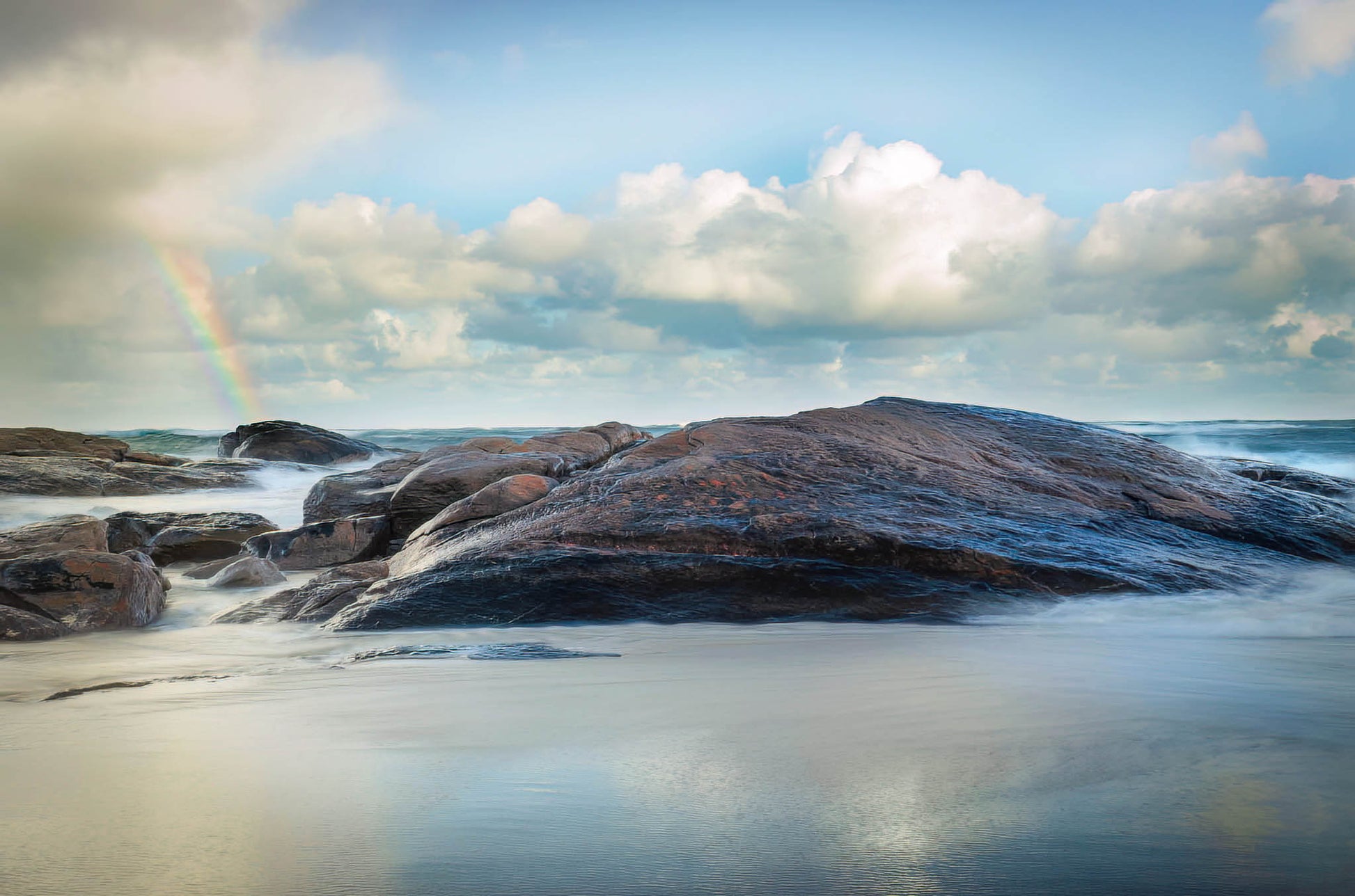 rainbow beach redgate southwest clouds rocks 