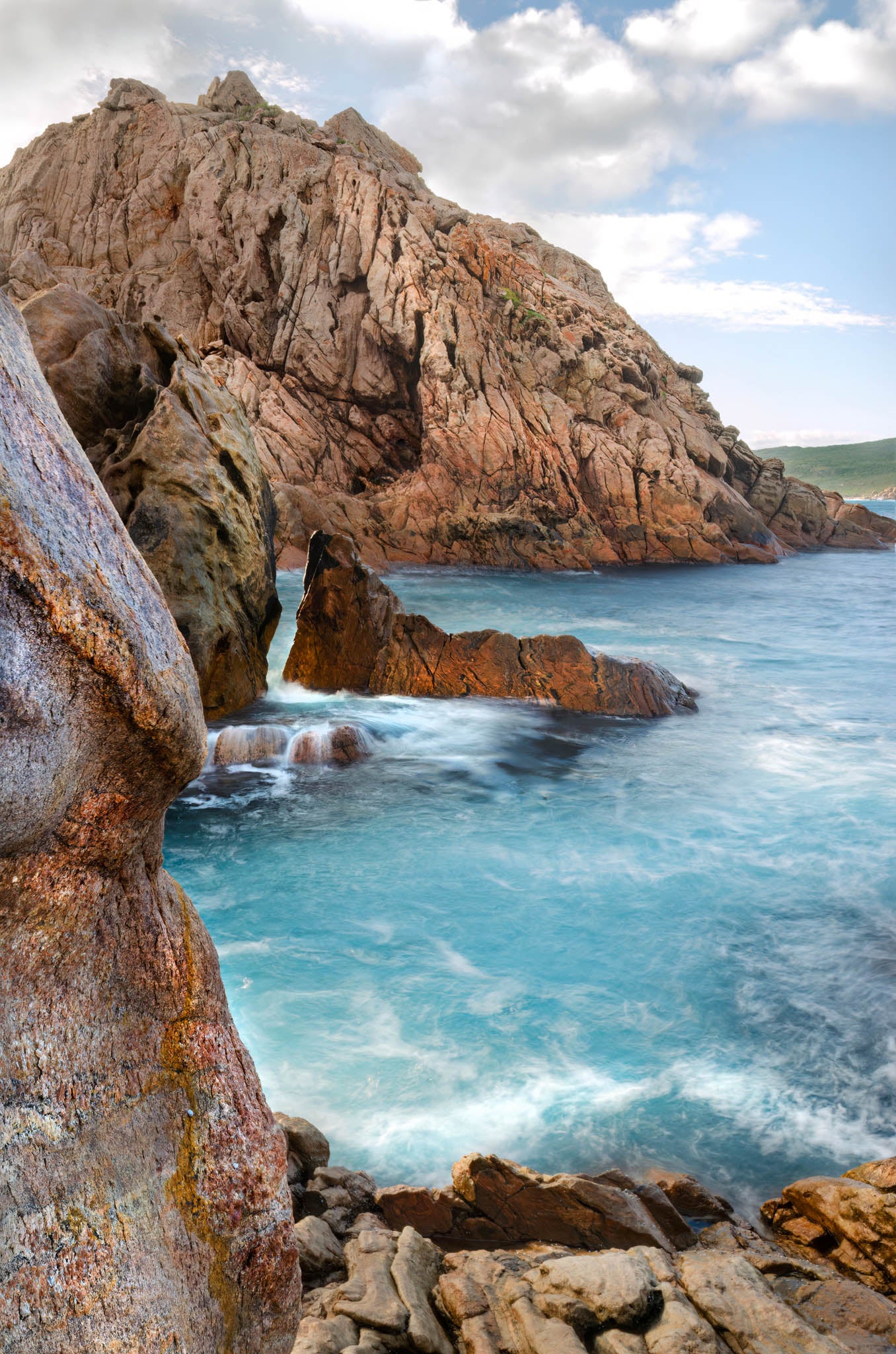 Turquoise water, showcased against the colour and texture of granite, at Sugarloaf Rock.