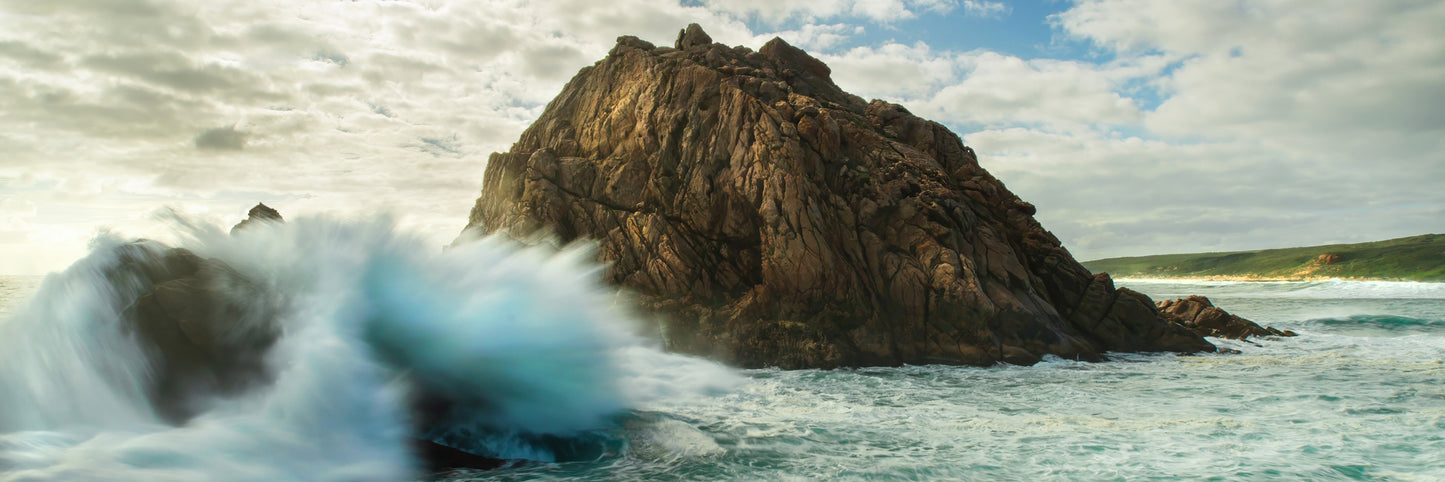 Crashing waves, showing no mercy towards anything in their path.