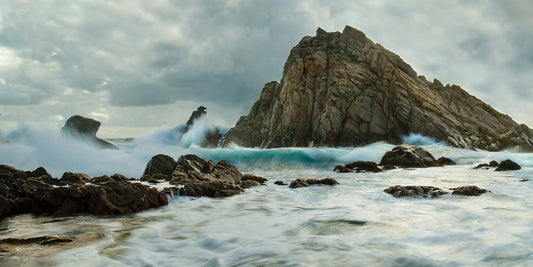Dramatic, stormy seascape at Sugarloaf Rock on a winter day.