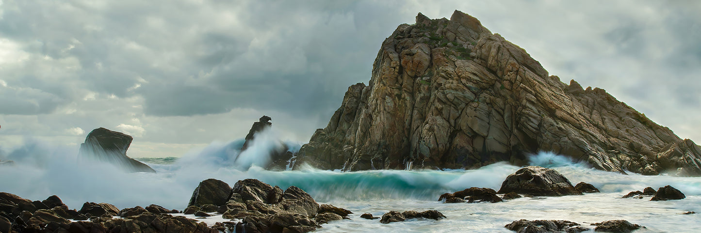 Dramatic, stormy seascape at Sugarloaf Rock on a winter day.