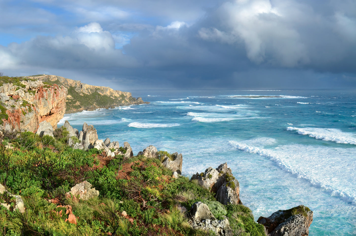 Textured limestone formations along Windy Harbour's rugged cliff tops.